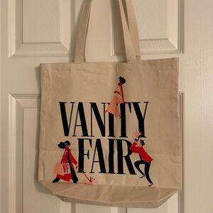 Vanity Fair Tan Tote with Black and Red Accents
